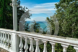 A typical picture of a southern resort town with a sea view from a balcony