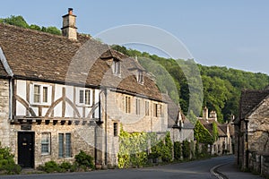 Typical and picturesque English countryside cottages in Castle Combe Village, Cotswolds, Wiltshire, England - UK