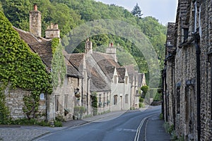 Typical and picturesque English countryside cottages in Castle Combe Village, Cotswolds, Wiltshire, England - UK