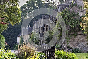 Typical and picturesque English countryside cottages in Castle Combe Village, Cotswolds, Wiltshire, England - UK