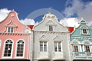 Typical pink, green & grey pastel painted architecture of Aruba, Curacao & Bonaire, Caribbean
