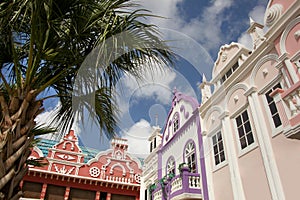 Typical pink, purple & red pastel painted architecture of Aruba, Curacao & Bonaire, Caribbean