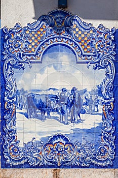 Typical Portuguese Azulejos (Blue tiles) depicting typical regional scenes