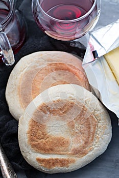 Typical portuguese bread Bolo do Caco with butter