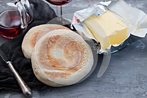 Typical portuguese bread Bolo do Caco with butter and knife