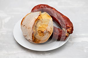 typical portuguese corn bread with smoked sausage chourico