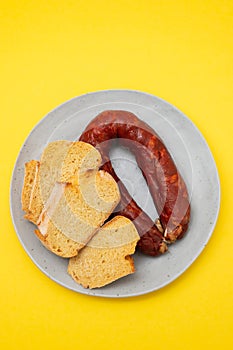 typical portuguese corn bread with smoked sausage chourico