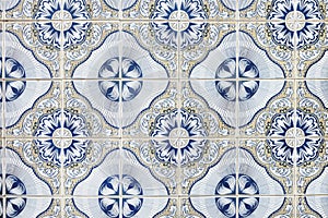 Typical Portuguese decorations on a wall with colored ceramic tiles. Traditional mosaic tiles Azulejos.