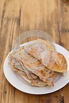 Typical portuguese dish bifanas vendas novas on white plate photo