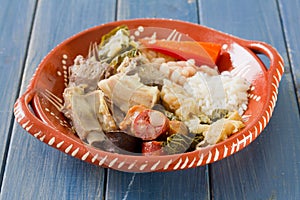 Typical portuguese dish on ceramic plate photo