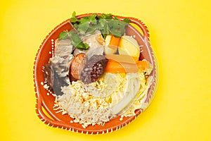 Typical portuguese dish cozido a portuguesa on ceramic dish photo