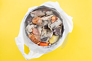 Typical portuguese dish cozido a portuguesa in plastic box take away photo