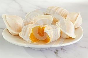 Typical portuguese egg yolk sweets called Ovos Moles de Aveiro photo