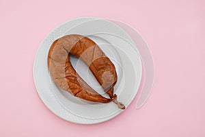 Typical portuguese sausage Farinheira with bread on white plate photo
