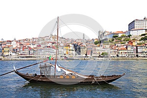 Typical portuguese wooden boats, in portuguese called barcos rabelos, used in the past to transport the famous port wine Portugal photo