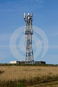 A typical radio and mobile phone network telecommunications tower situate in farmland near Groomsport in County Down, Northern Ire
