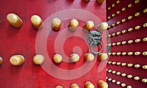 Typical red door of chinese palace