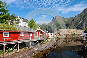 Typical red rorbu fishing hut in town of Svolvaer