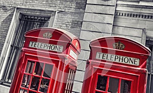 Typical red telephone booths in London