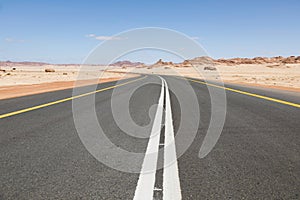 Typical road in Saudi Arabia that leads through the desert