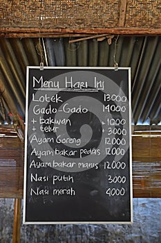 Typical roadside stall in Indonesia with Today's Menu written on board