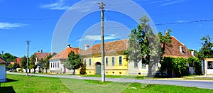 Typical rural landscape and peasant houses in Cincsor, Kleinschenk, Transylvania, Romania.