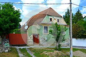 Typical rural landscape and peasant houses in the village Drauseni, Transylvania, Romania.