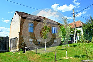 Typical rural landscape and peasant houses in the village Felmer, Felmern, Transylvania, Romania.