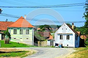 Typical rural landscape and peasant houses in the village Somartin, Martinsberg, MÃƒÂ¤rtelsberg, Transylvania, Romania.