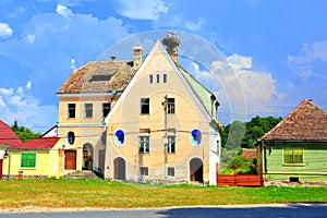 Typical rural landscape and peasants houses in Dealu Frumos, Schoenberg, Transilvania, Romania photo