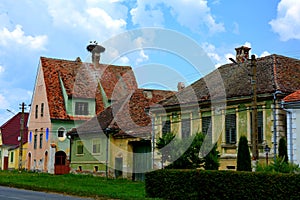 Typical rural landscape and peasants houses in Dealu Frumos, Schoenberg, Transilvania, Romania photo