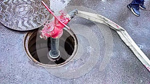 Typical Russian red fire hydrant underground