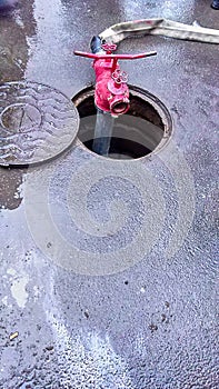 Typical Russian red fire hydrant underground