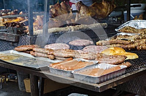 Typical Sardinian food. Sausages roast, bread, steaks roast, pig