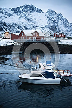 Typical scandinavian red houses and unfrozen sea