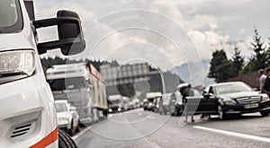 Typical scene on European highways during summer holiadays rush hour. A traffic jam with rows of cars tue to highway car