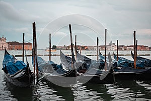 Typical scene of parked gondolas in Venice.