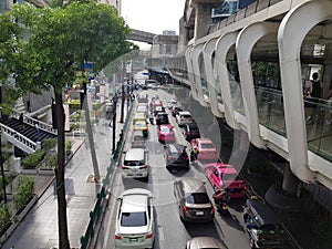 Typical scene during rush hour. A traffic jam with rows of cars. Shallow depth of field.