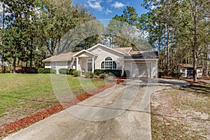 Typical Single Floor American House with Front Yard and Spacious Driveway Exterior Street View