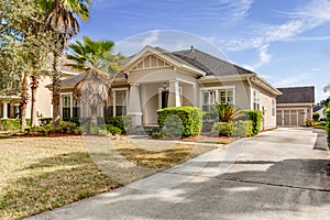 Typical Single Floor American House with Front Yard and Spacious Driveway Exterior Street View