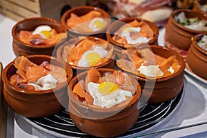 Typical snack of Basque Country and Navarre, pinchos or pinxtos served in bar, San Sebastian, Spain