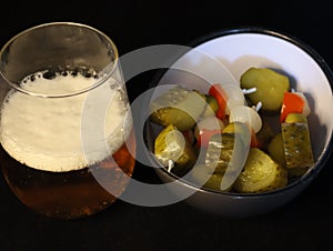 Typical Spanish aperitif accompany pickle beer olives pepper photo