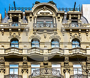 Typical Spanish balconies on imposing old building in Barcelona, Spain