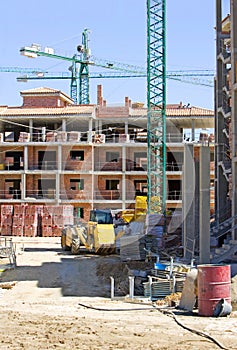 Typical Spanish building site with half built property and crane