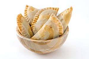 Typical Spanish empanadas in bowl isolated