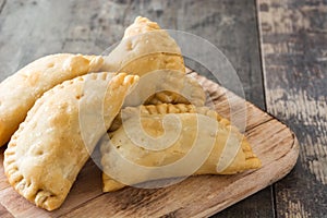 Typical Spanish empanadas on wood