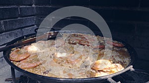 Typical Spanish rice paella cooked with natural fire