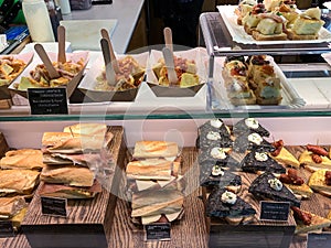 Typical spanish tapas in local market in the Madrid downtown