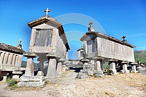 Typical stone corn driers, called Espigueiros in Soajo, north of Portugal photo