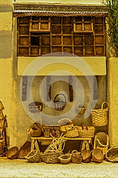 Typical street with esparto and wicker furnishings, in a doorway in Belen.